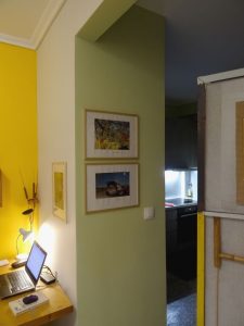 The Oasis Apartment - a living room/kitchen view